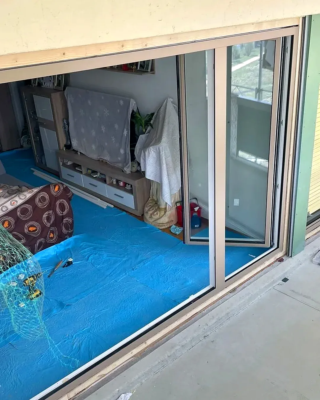 Baie coulissante, Remplacement en site occupé, intérieur protégé.